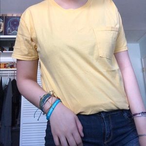 yellow pocket tee